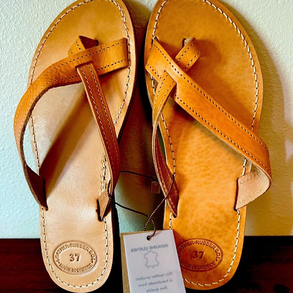 Leather sandals NWOT color of sandals is the picture in bag.